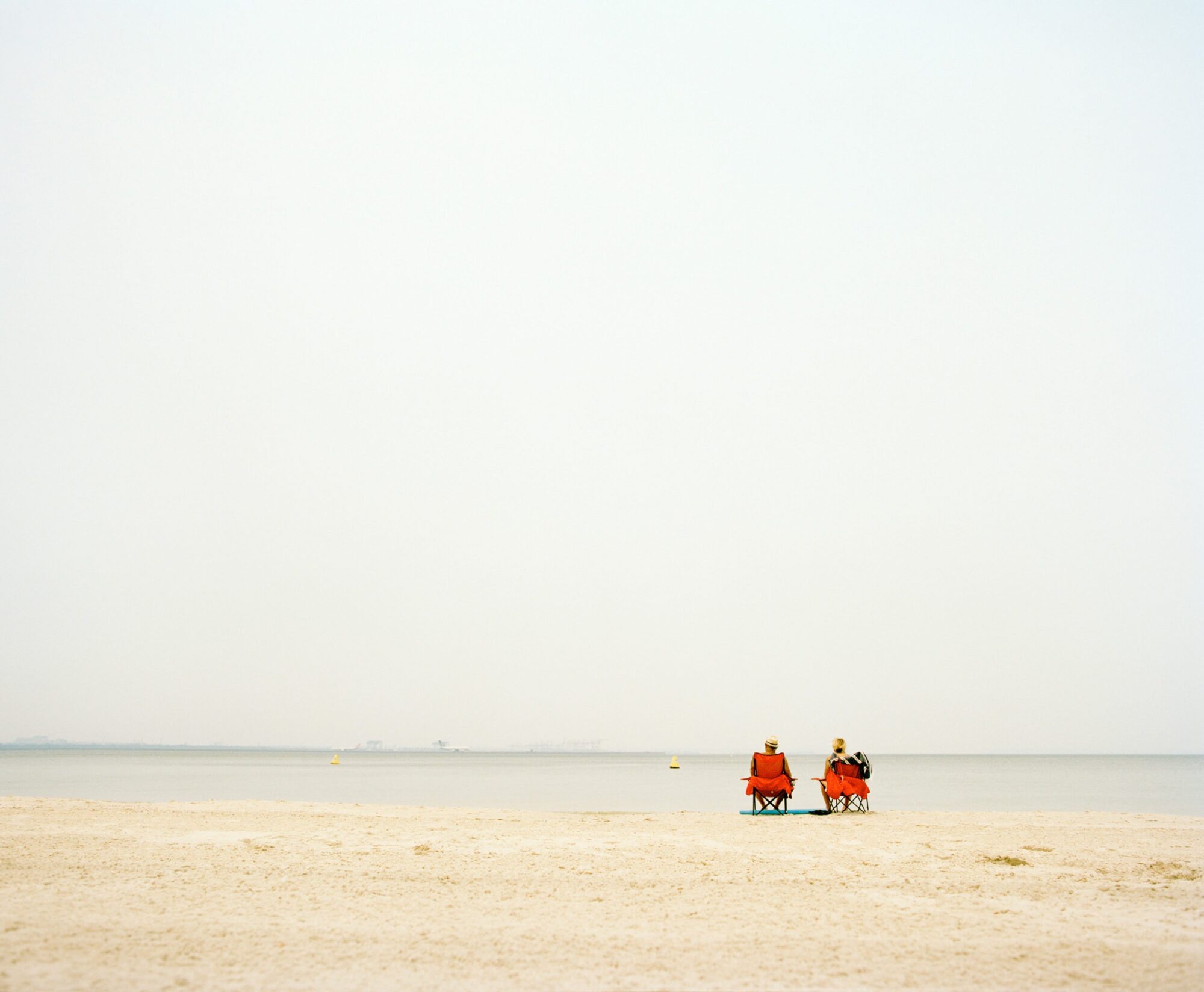 Red Deck Chairs - Concrete Collection - Fine Art Photography by Toby Dixon